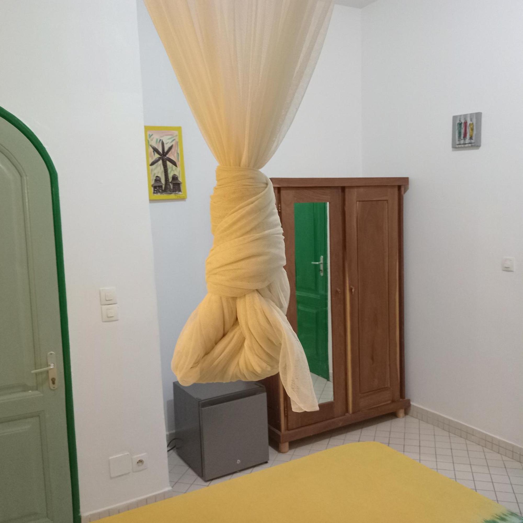 Keur Diam - Maison De La Paix Saly Portudal Bagian luar foto